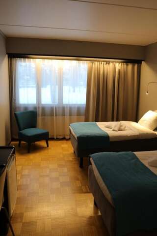 Отель Hotel Nukkumatti Коккола Двухместный номер бизнес-класса с 2 отдельными кроватями-7